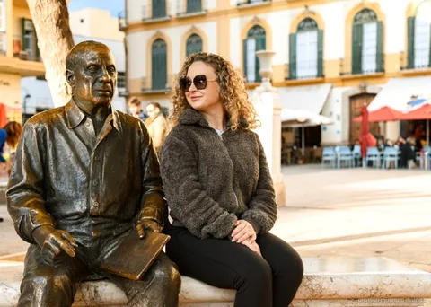 Guide leading the Picasso history walking tour through Malaga's old town