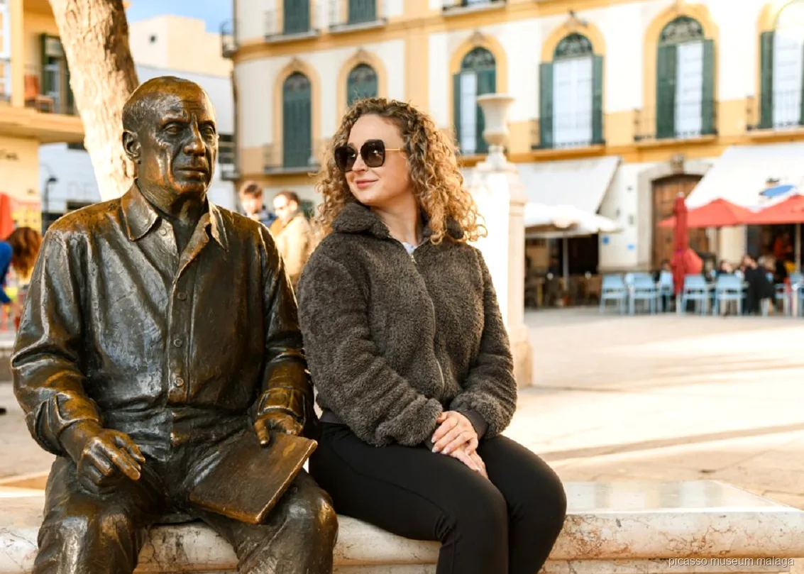 Guide leading the Picasso history walking tour through Malaga's old town